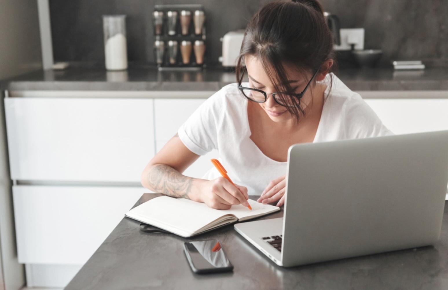 Development workspace with multiple monitors showing responsive design testing